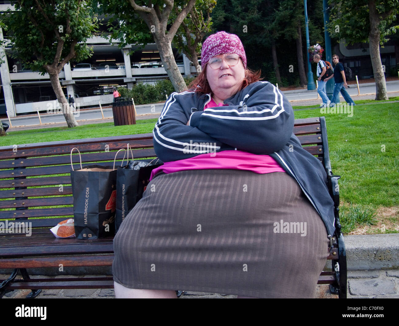 obese-lady-on-park-bench-san-francisco-california-C70FX0.jpg