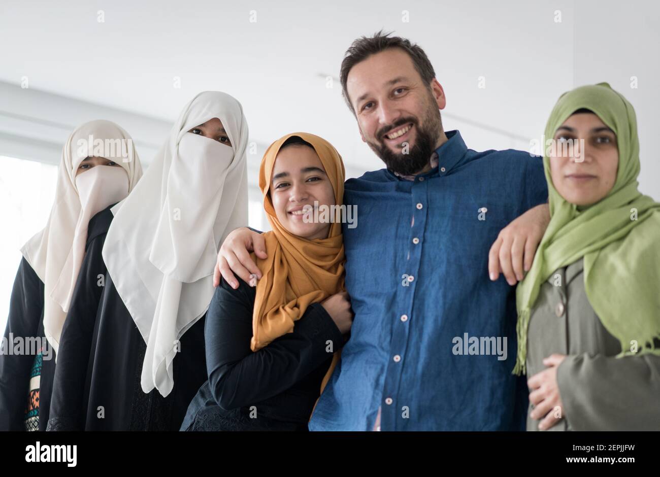 muslim-man-with-4-wives-portrait-quality-photo-2EPJJFW.jpg