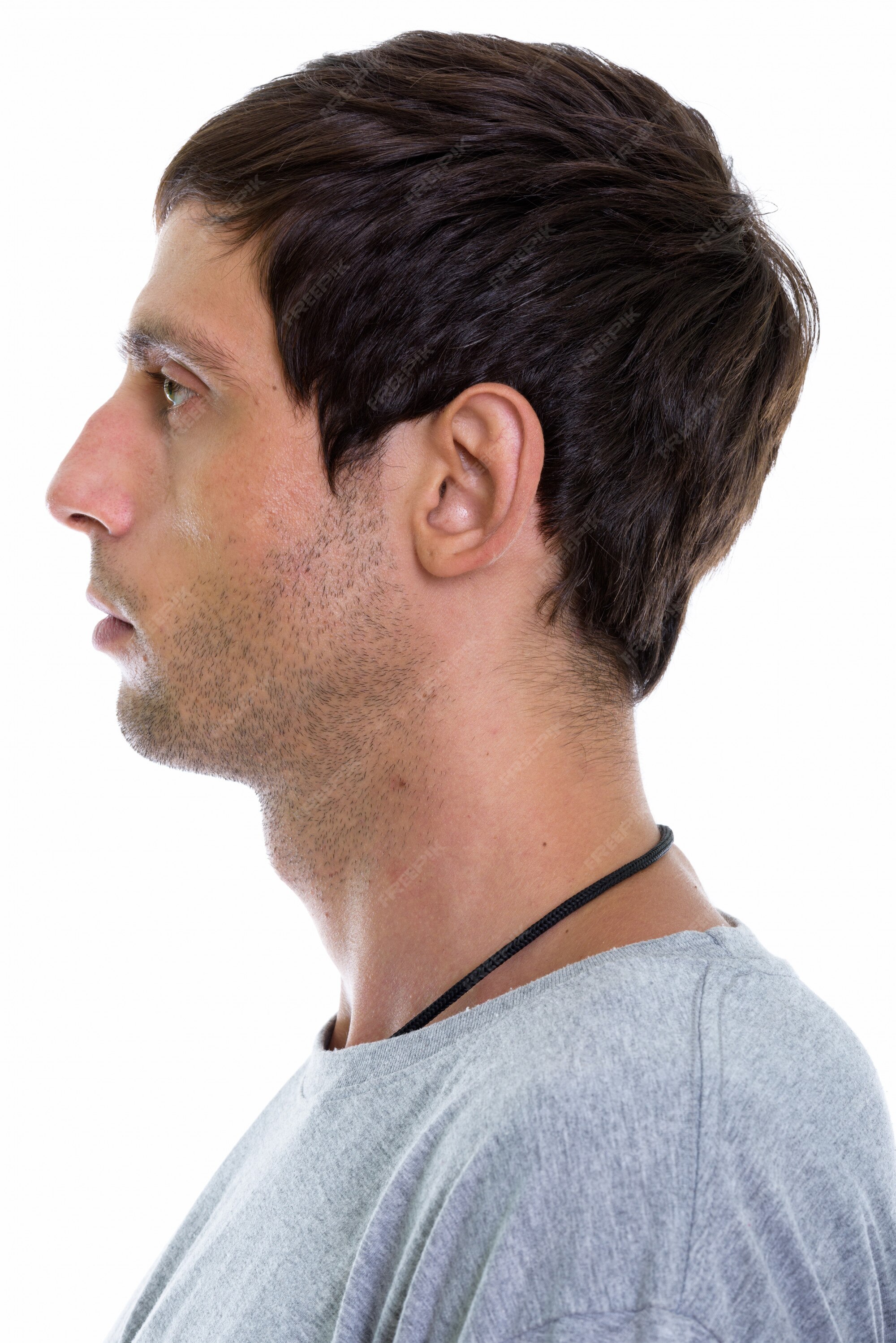 Premium Photo | Profile view of face of young handsome man