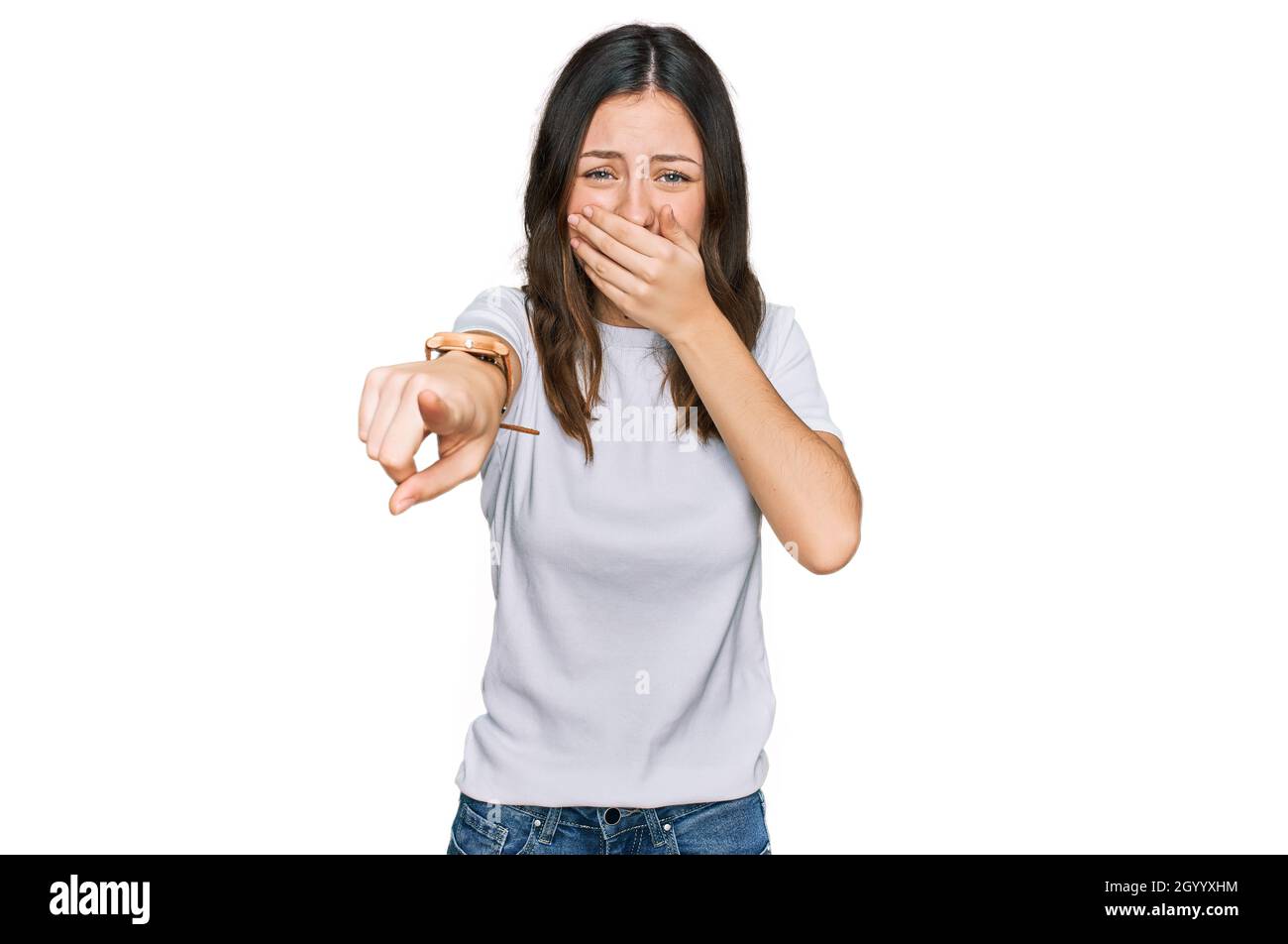 young-beautiful-woman-wearing-casual-white-t-shirt-laughing-at-you-pointing-finger-to-the-camera-with-hand-over-mouth-shame-expression-2GYYXHM.jpg
