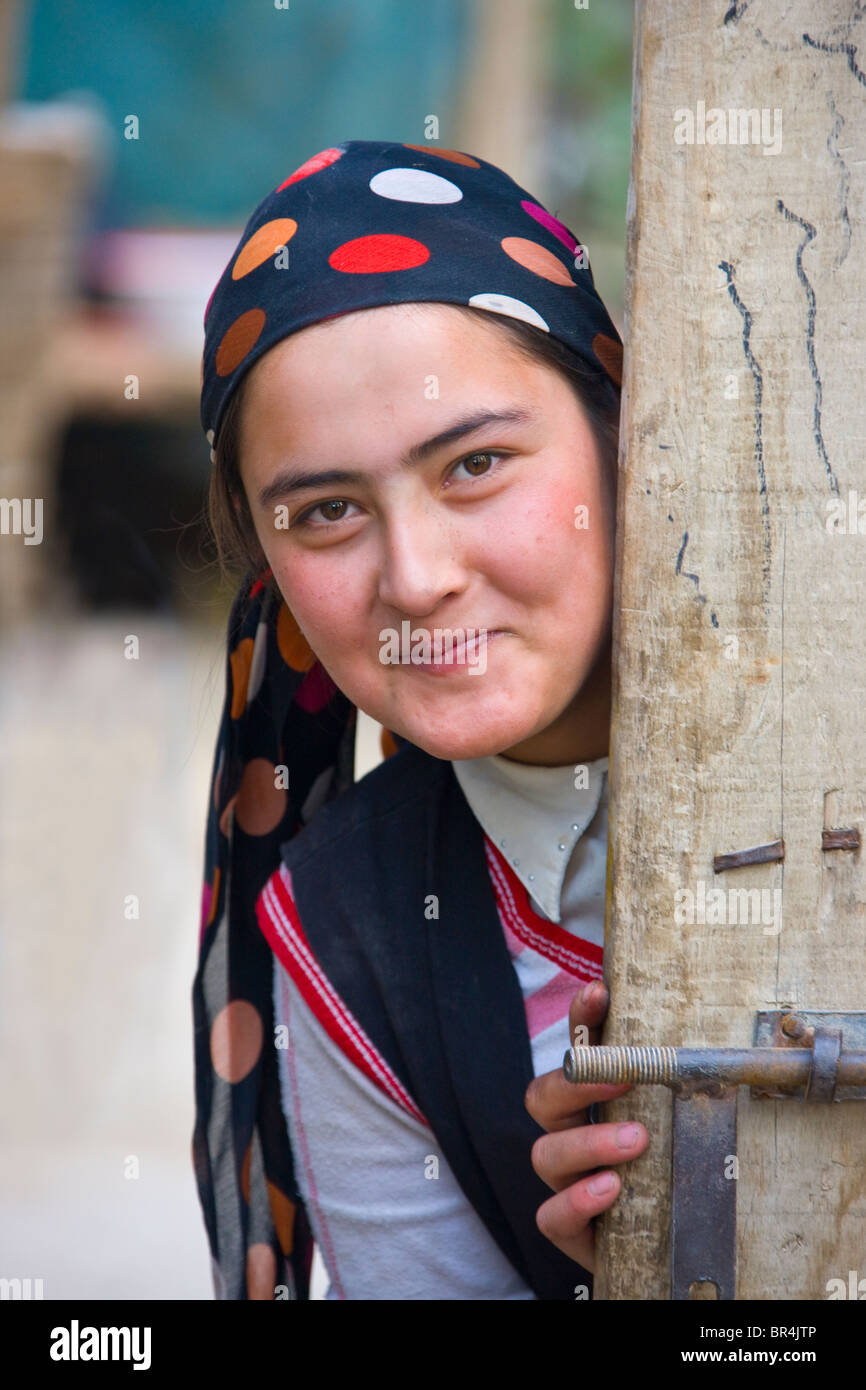 uighur-girl-by-the-door-hotan-xinjiang-china-BR4JTP.jpg