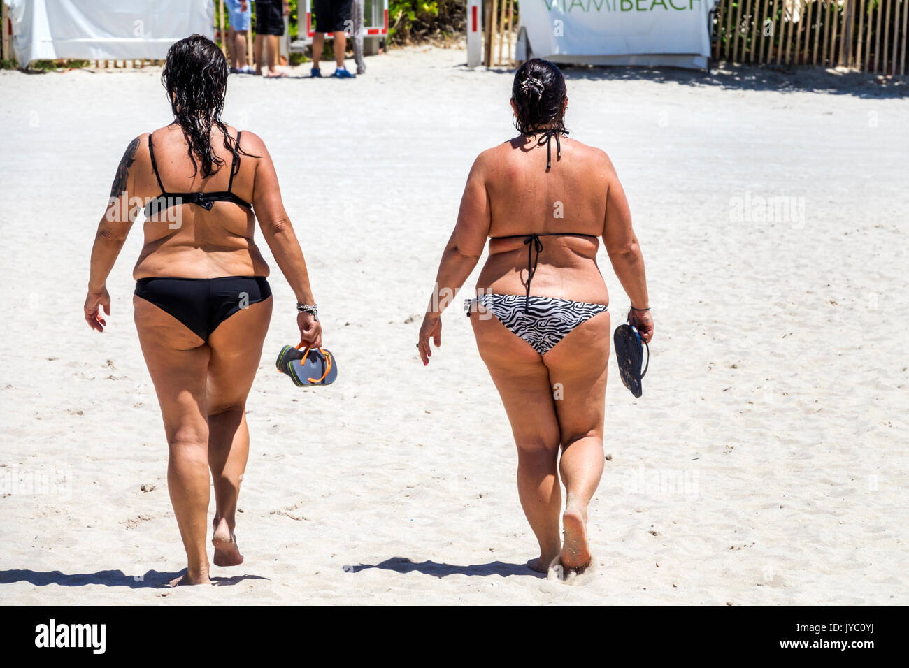 florida-miami-beach-sand-adult-adults-woman-women-female-lady-bikini-JYC0YJ.jpg