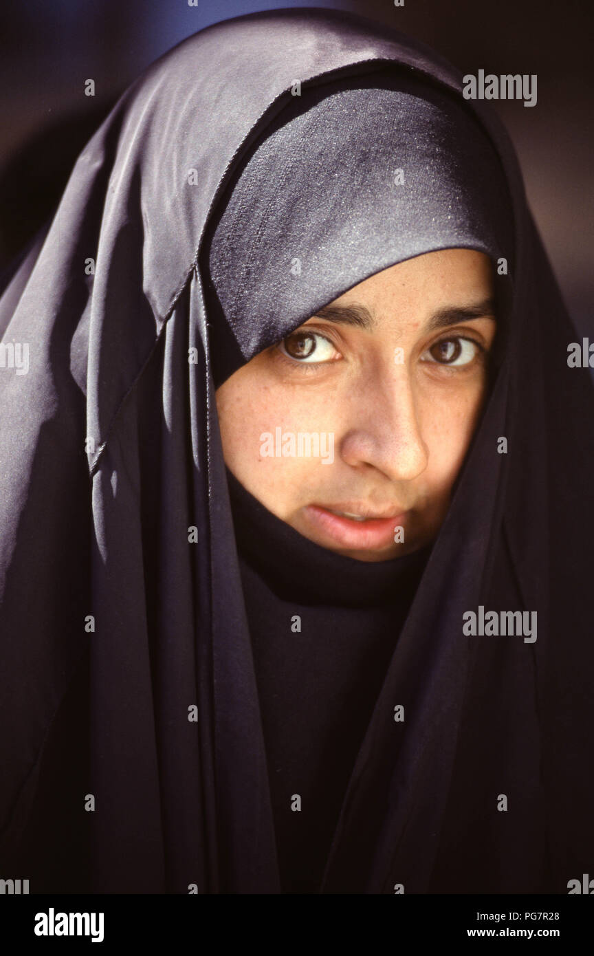 baghdad-iraq-october-1995-portrait-of-an-iraqi-woman-iraqis-finding-it-hard-to-maintain-standard-of-living-due-to-the-strict-un-sanctions-imposed-during-the-1990s-because-of-iraqs-invasion-of-kuwait-in-1990-PG7R28.jpg