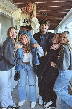 Kaylee Goncalves (second from left, bottom) and Madison Mogen (second from left, top), Ethan Chapin (center) and Xana Kernodle (second from right)