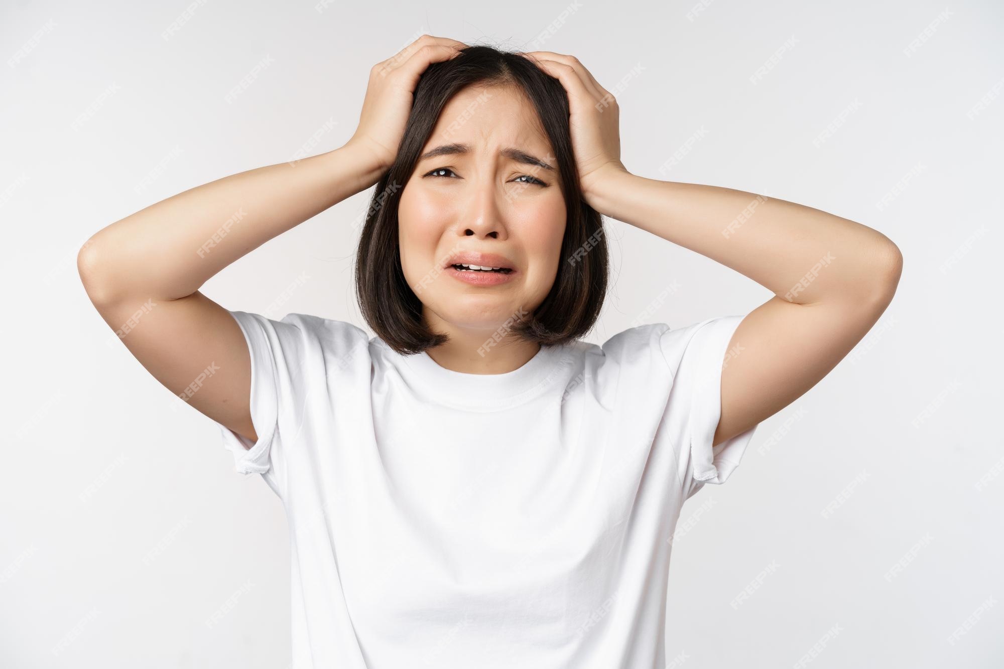 desperate-young-korean-woman-holding-hands-head-panicking-crying-standing-distressed-against-white-background_1258-88986.jpg