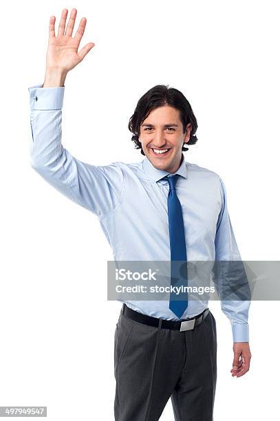 businessman-waving-hi-to-his-colleague.jpg