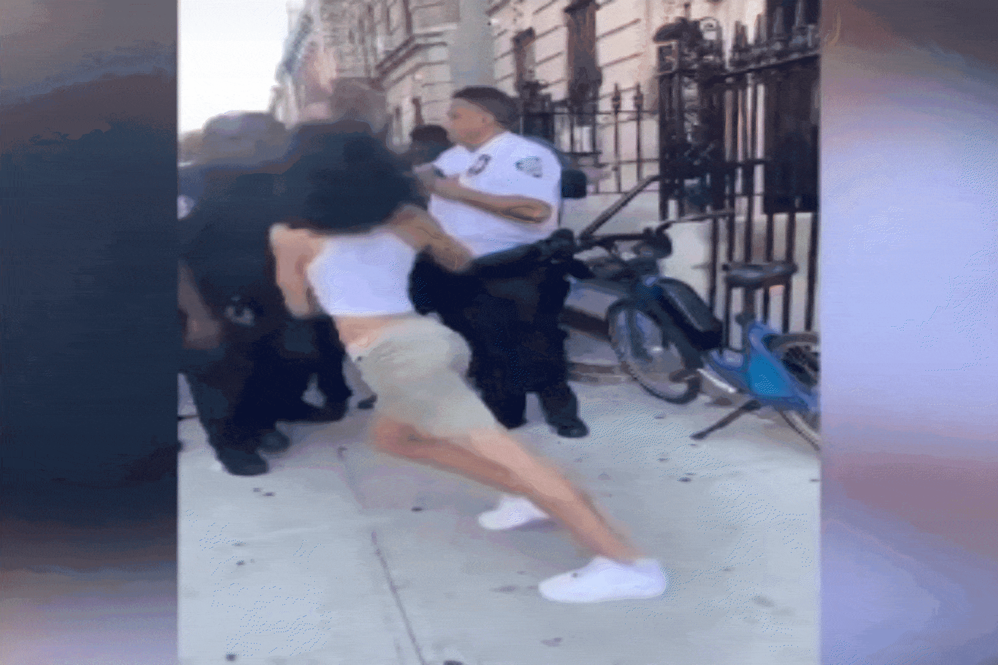 cop-punches-woman-1.gif