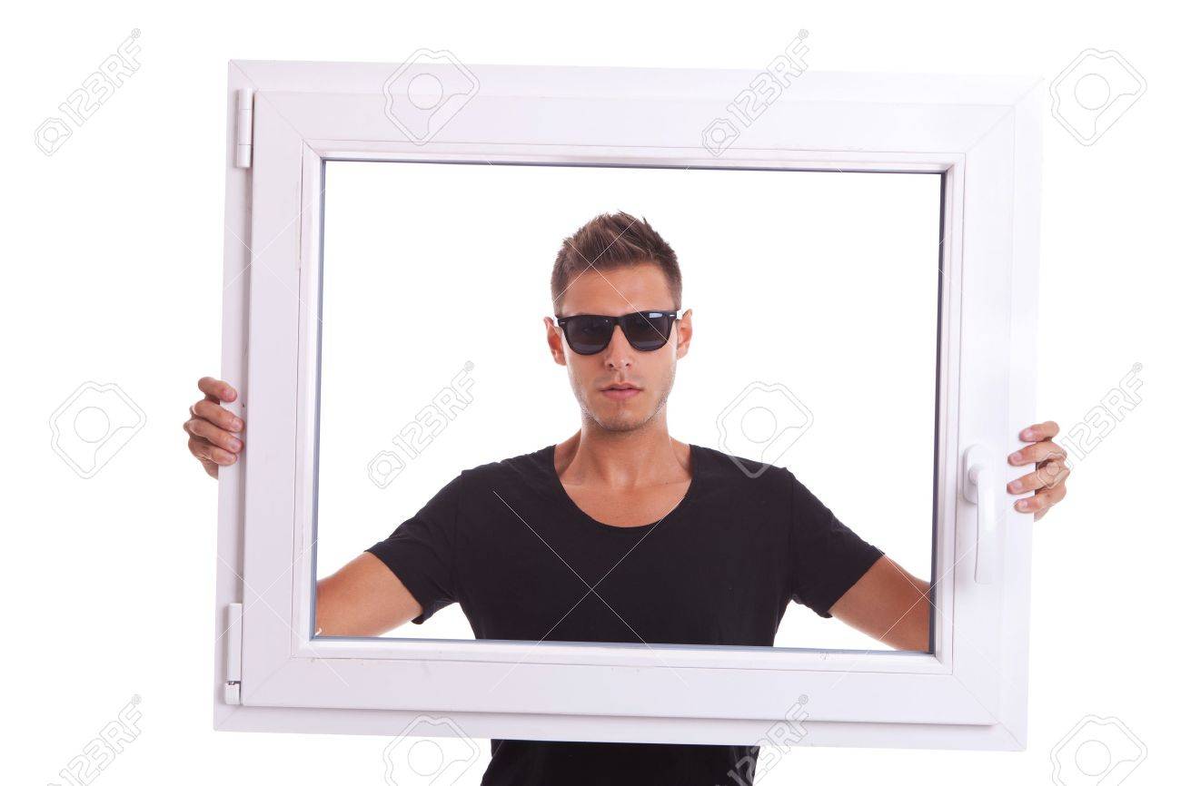 16014376-young-man-wearing-sunglasses-is-holding-a-pvc-window-frame-on-white-background.jpg