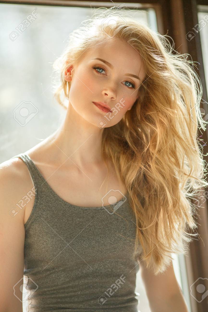 89354904-romantic-blonde-young-beautiful-cute-woman-beauty-girl-with-long-shiny-hair-glowing-skin-and-volumin.jpg