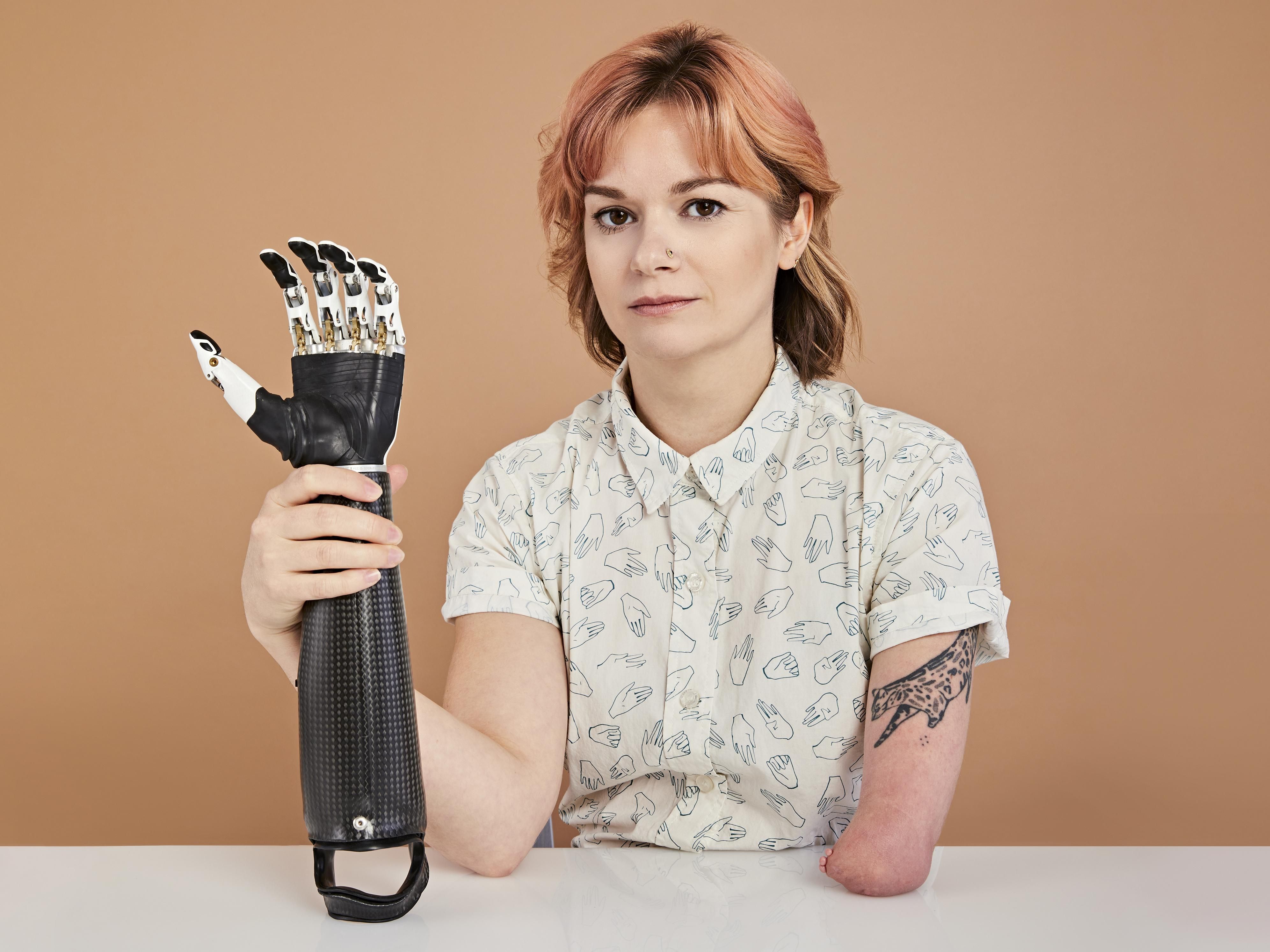 less-than-p-greater-than-the-author-britt-young-holding-her-ottobock-bebionic-bionic-arm-less-than-p-greater-than.jpg