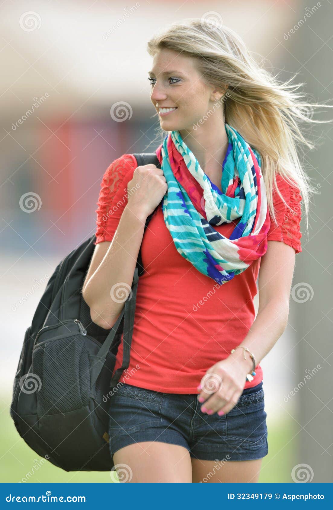 beautiful-young-blonde-female-student-stunning-woman-walking-her-backpack-green-grass-college-campus-32349179.jpg