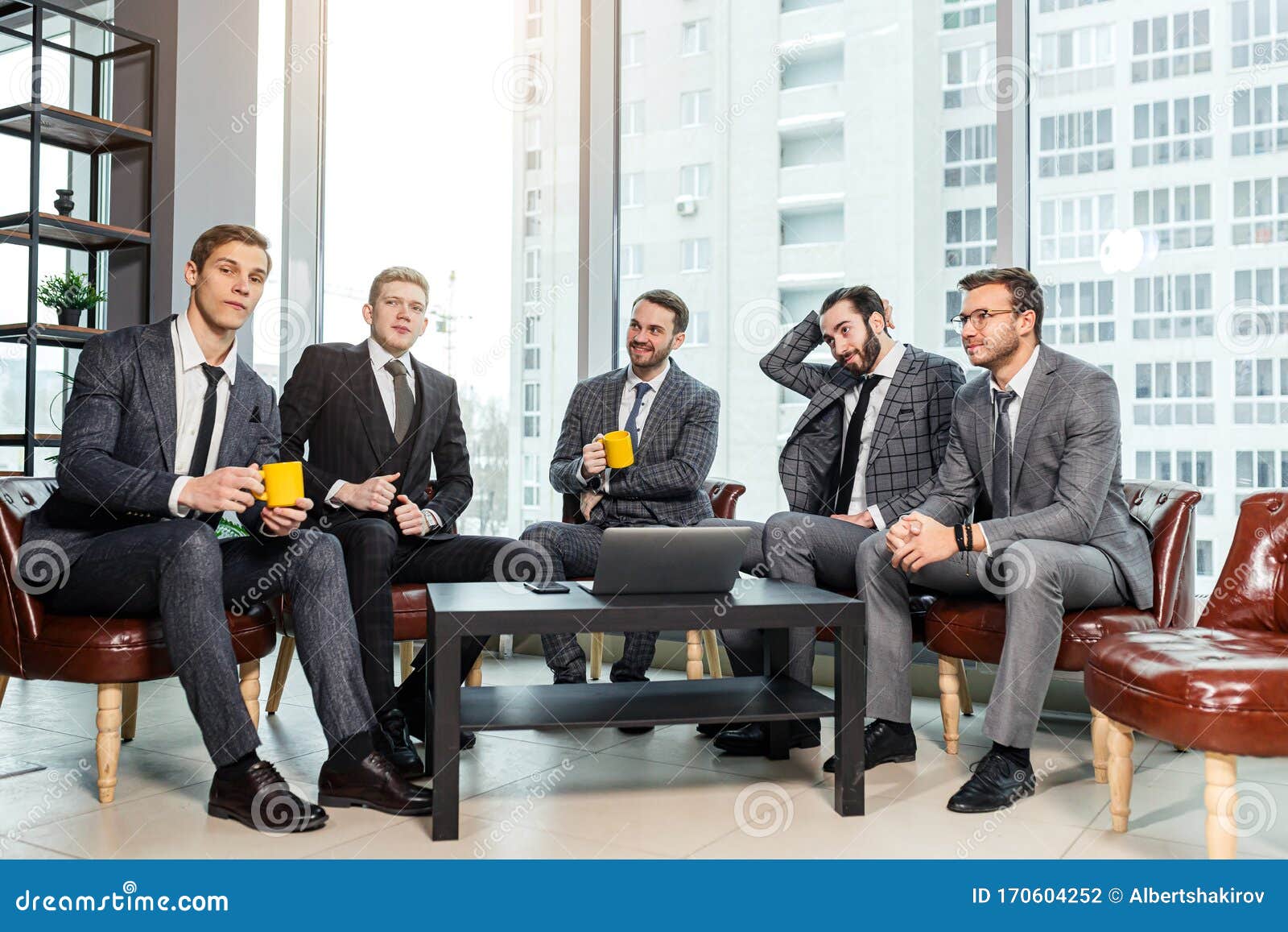 group-business-men-have-active-discussion-modern-office-young-gathered-together-to-discuss-strategies-new-ideas-170604252.jpg