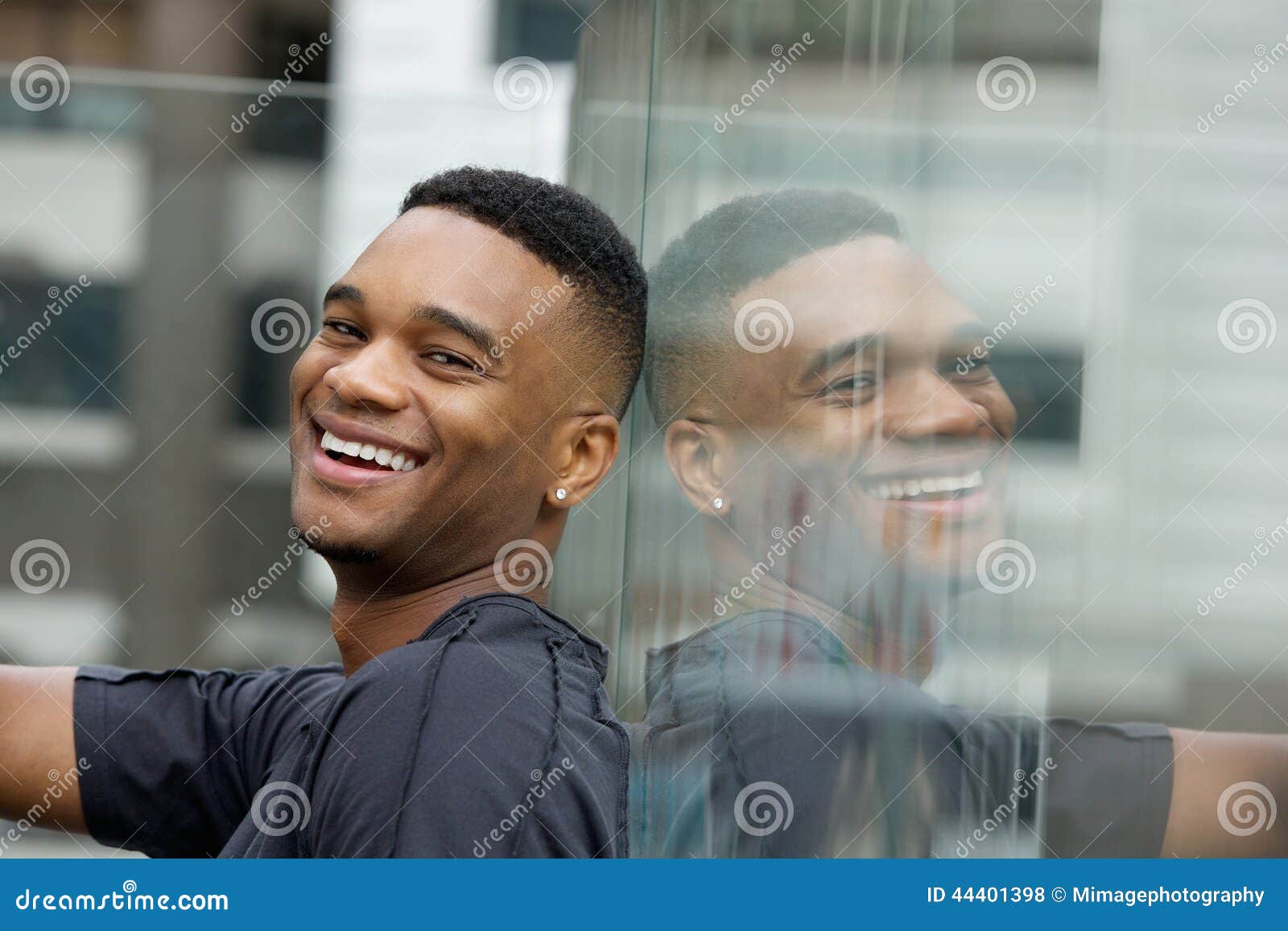 handsome-young-black-man-smiling-close-up-portrait-44401398.jpg