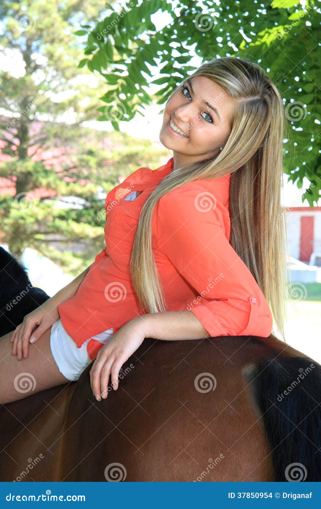 pretty-blonde-high-school-senior-girl-outdoor-horse-37850954.jpg