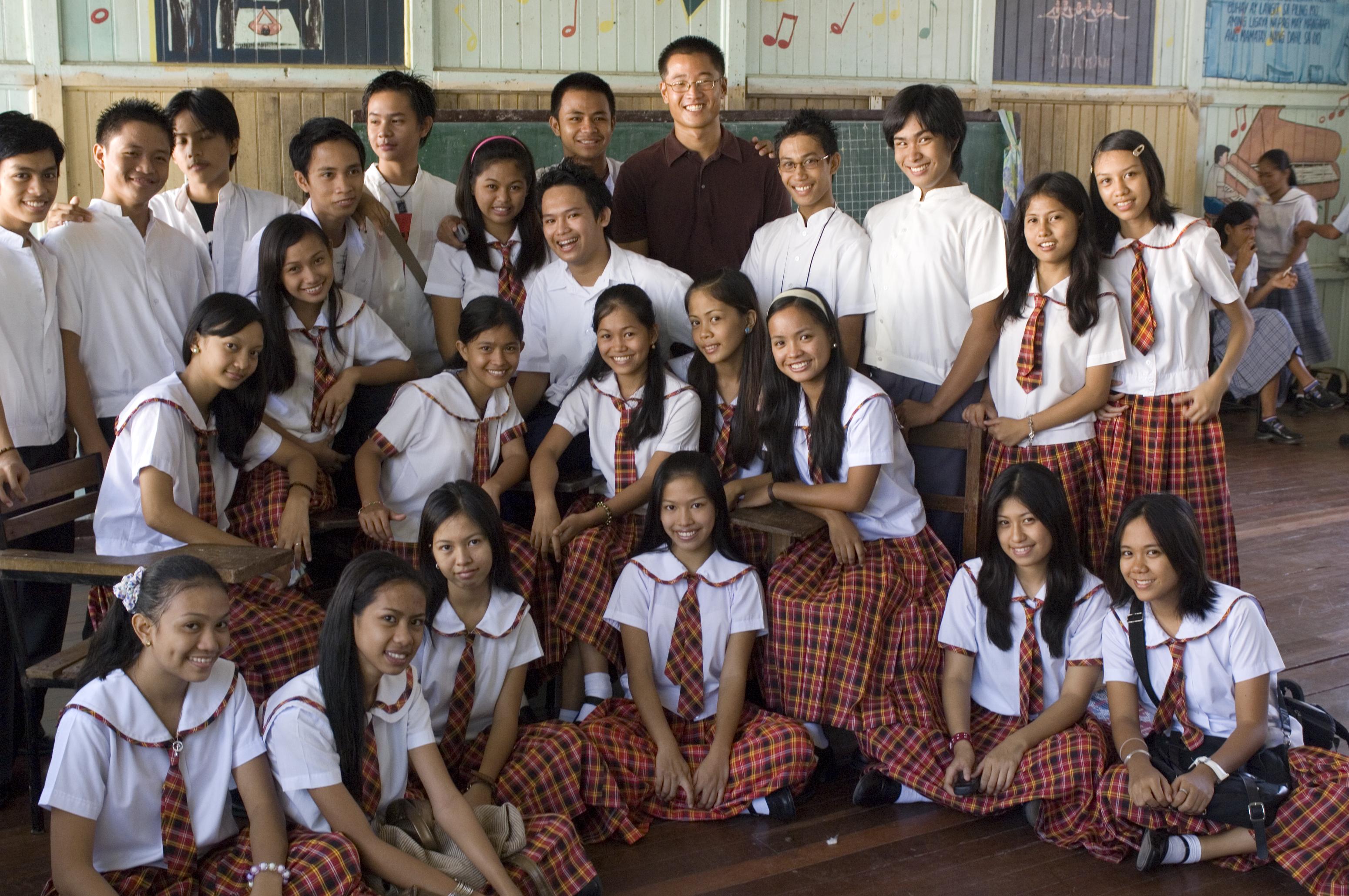 An_Education_Volunteer_with_his_high_school_students_in_the_Philippines.jpg