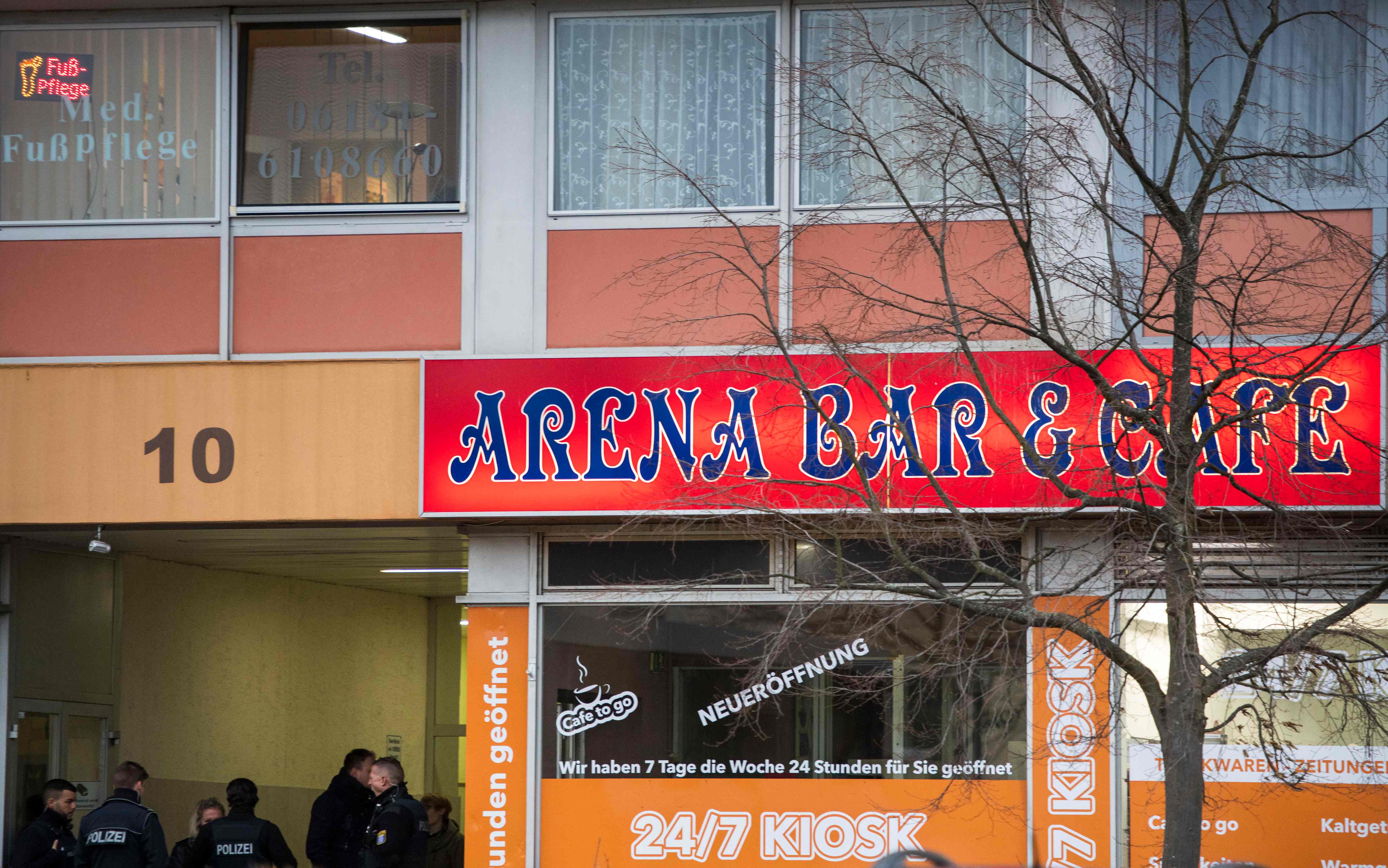 Police officers secure the Arena shisha bar in Hanau which was targeted in the shooting