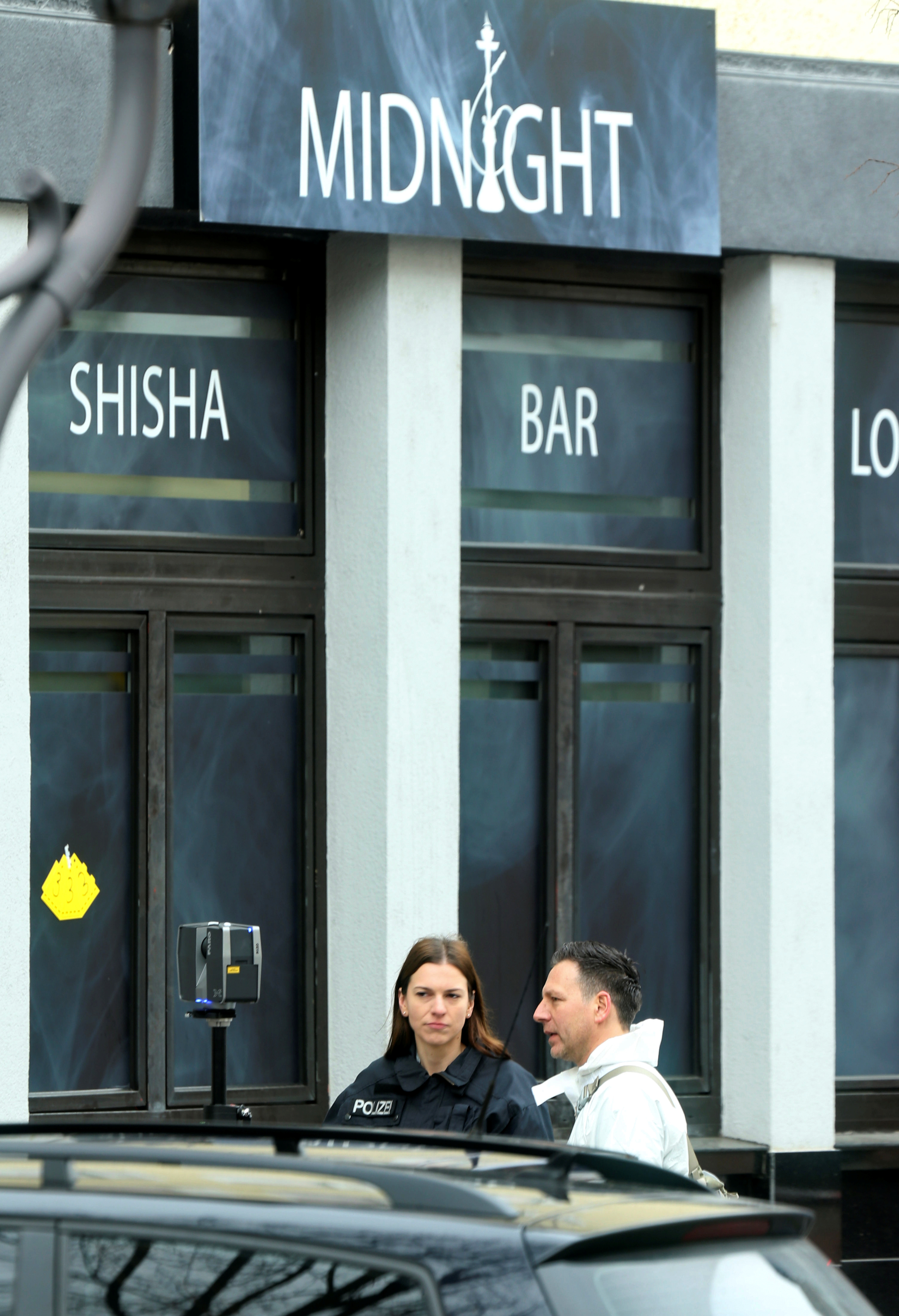  The horror unfolded about 10pm when the gunman stormed the Midnight Shisha bar nearby